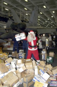 Santa Clause helps pass out mail Santa Clause helps pass out mail